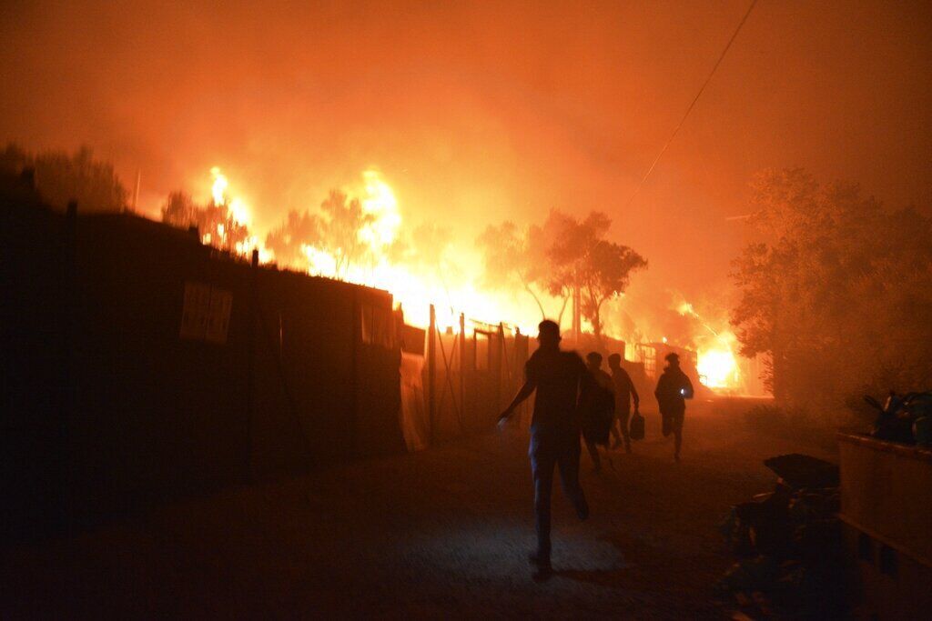 APTOPIX Greece Migrant Camp Blaze